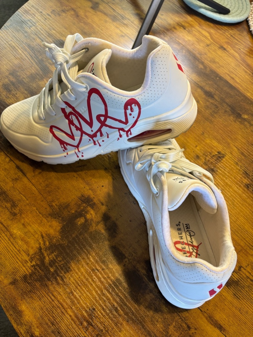 Skechers White Chunky Sneakers with Red Drip Heart Graphic